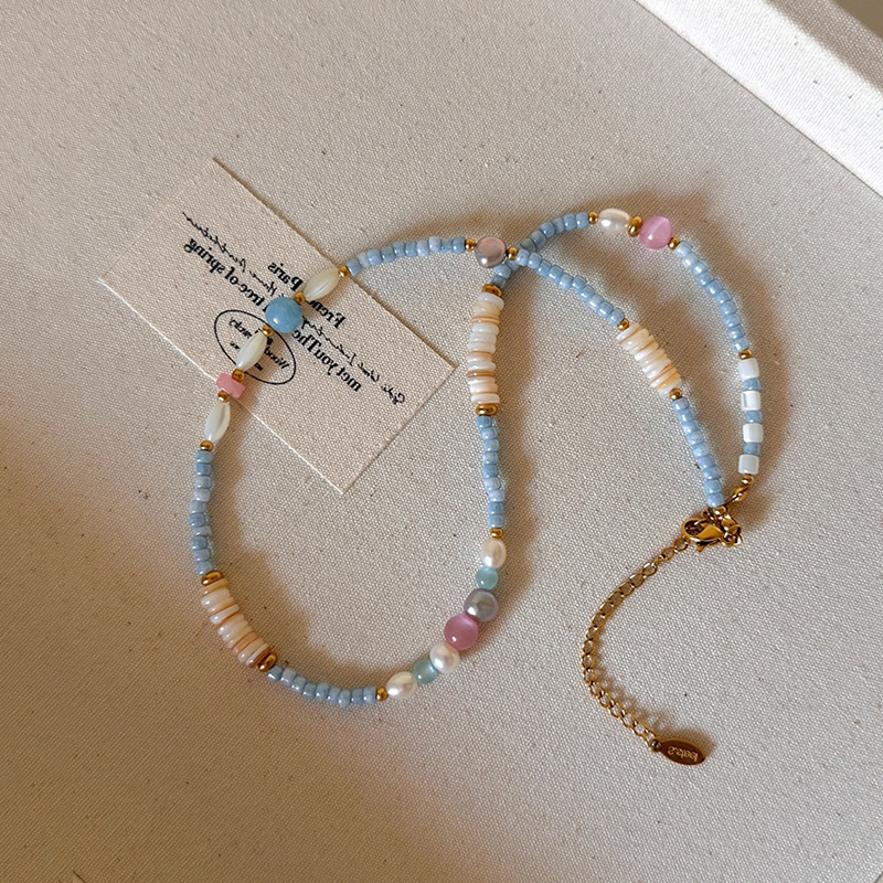 add a pearl necklace